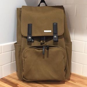 Modern canvas and leather backpack in Ochre